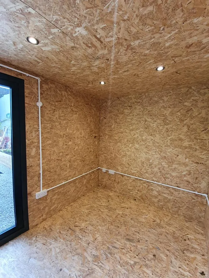 Power sockets and downlights fitted in a garden office